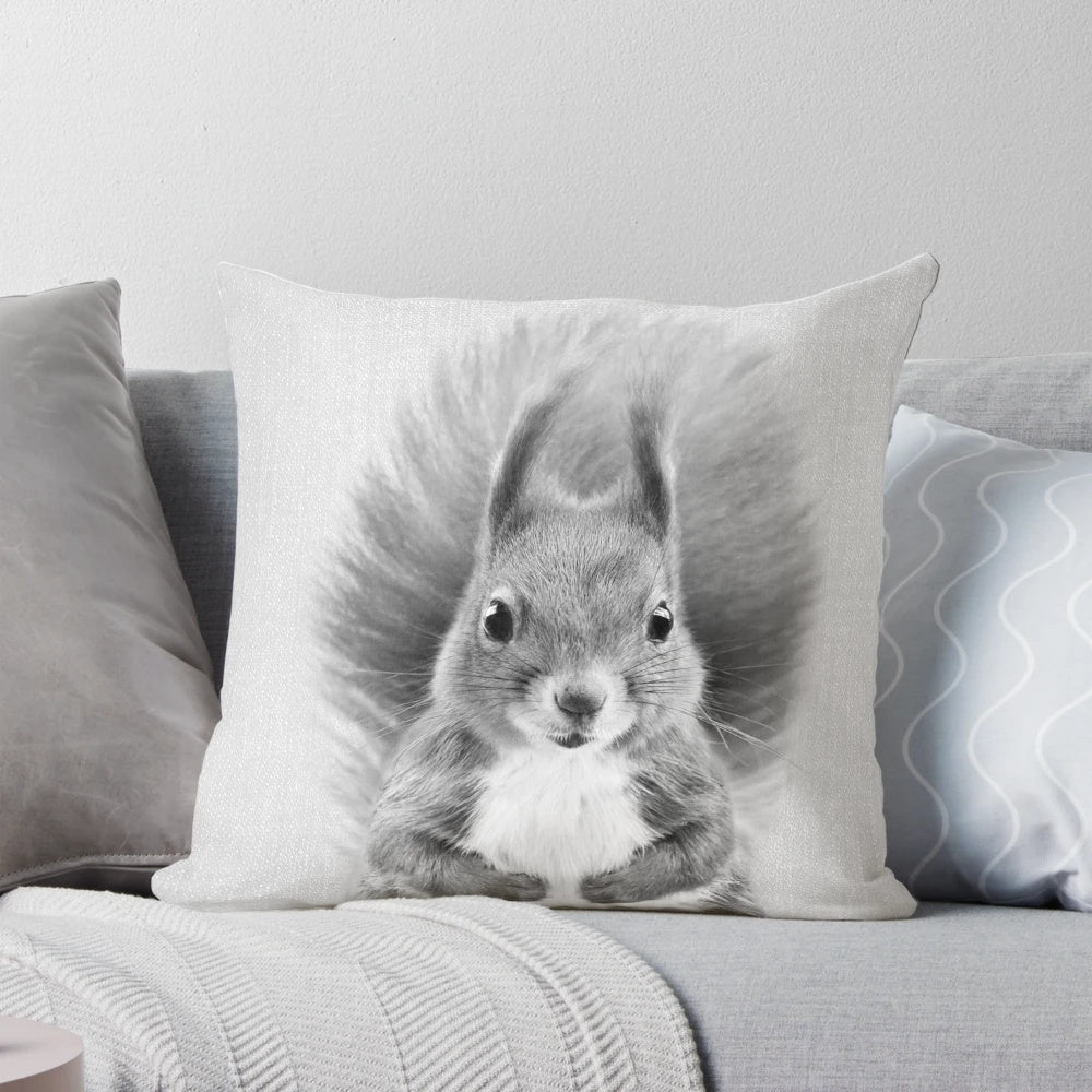 Stylish black and white pillow featuring a portrait of a cute, curious squirrel in a minimalist, nature-inspired design.