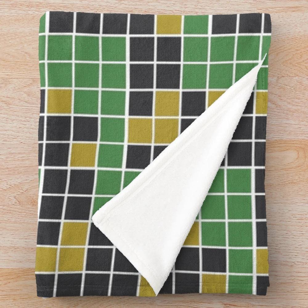 Cozy plush blanket with Wordle grid design for Wordle fans