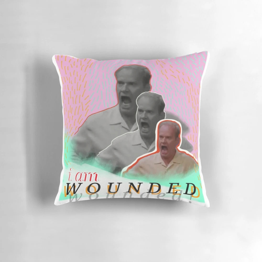 Frasier Crane, the iconic television character from Frasier, depicted in a wounded, pop art style on a decorative pillow.