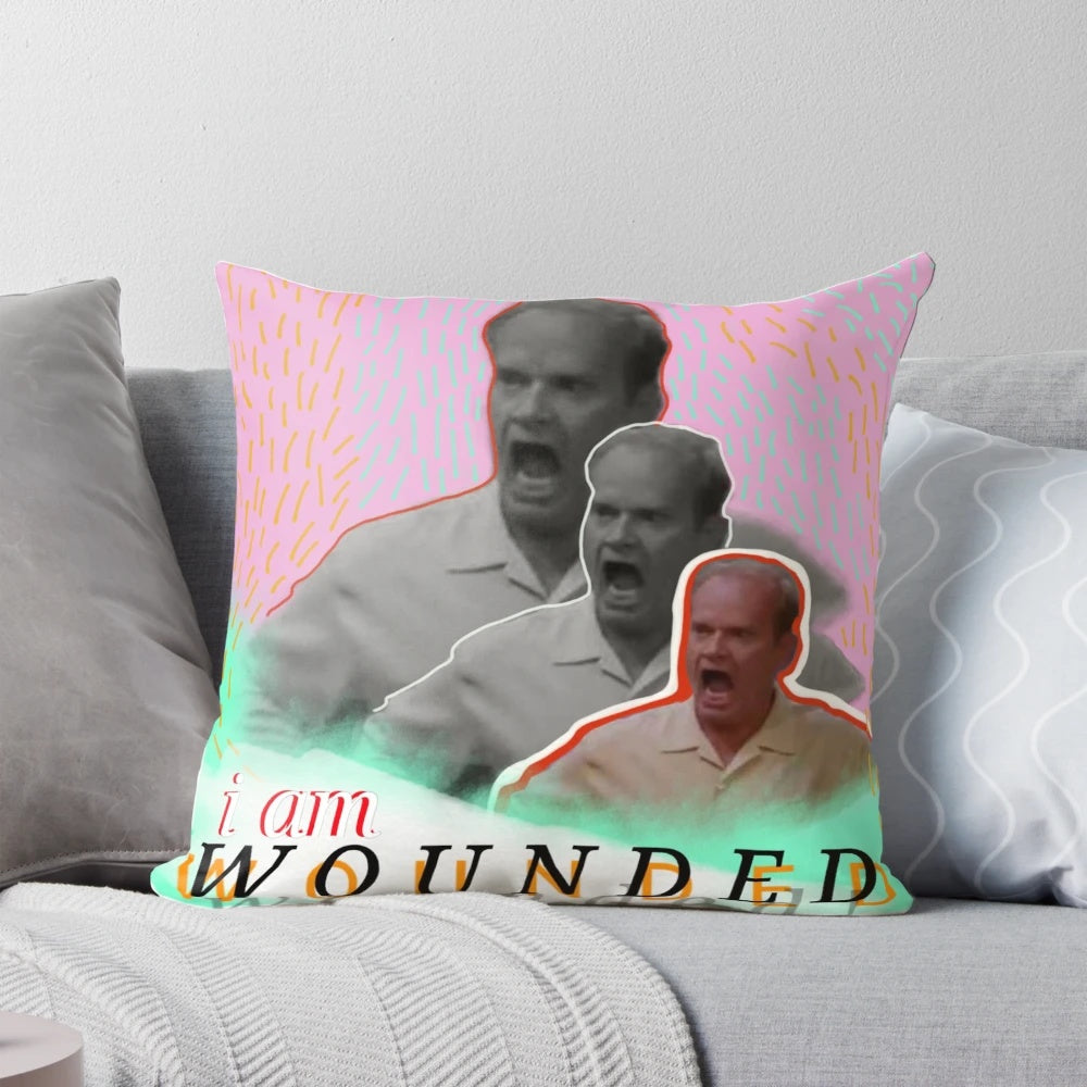 Frasier Crane, the iconic television character from Frasier, depicted in a wounded, pop art style on a decorative pillow.