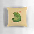 A round, cottagecore-inspired pillow featuring a cute frog design, perfect for practicing yoga's cross-legged Sukhasana pose.