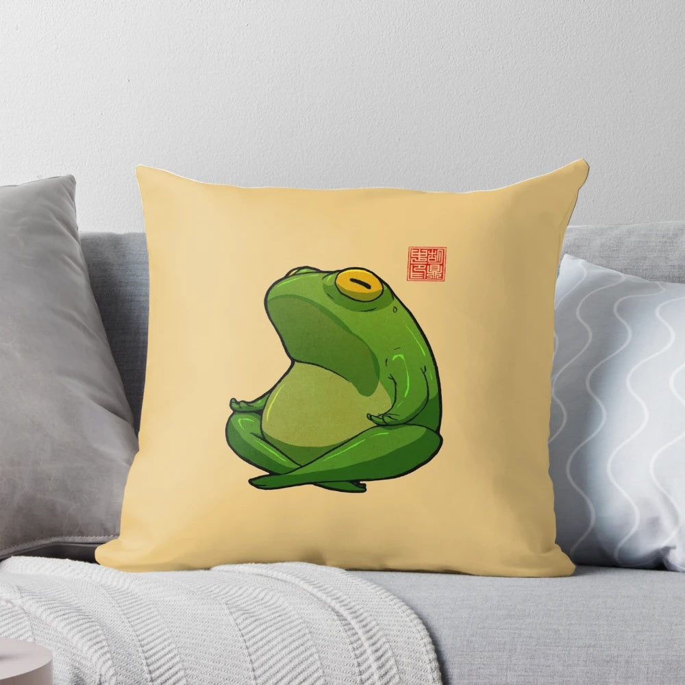 A round, cottagecore-inspired pillow featuring a cute frog design, perfect for practicing yoga's cross-legged Sukhasana pose.