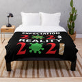 Plush blanket with "Your Job Could Be Worse" funny saying