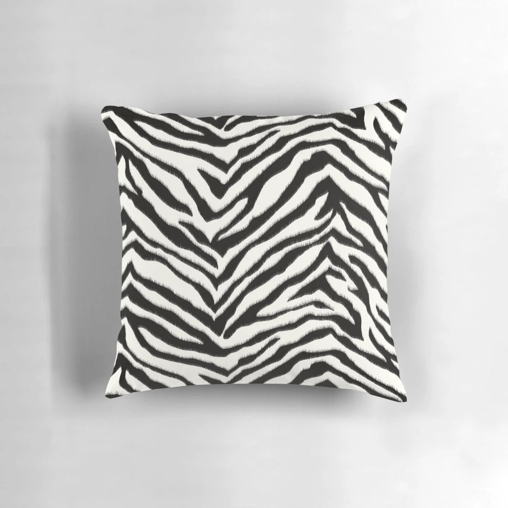 Zebra-patterned accent pillow with a quirky, mafia-inspired style
