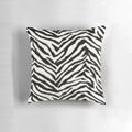 Zebra-patterned accent pillow with a quirky, mafia-inspired style