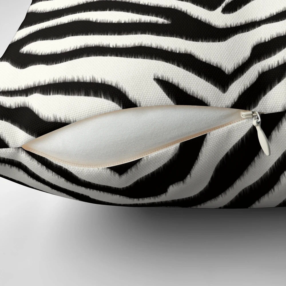 Zebra-patterned accent pillow with a quirky, mafia-inspired style