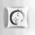 Pillow featuring a minimalist, zen-inspired enso circle design and a tree of life motif