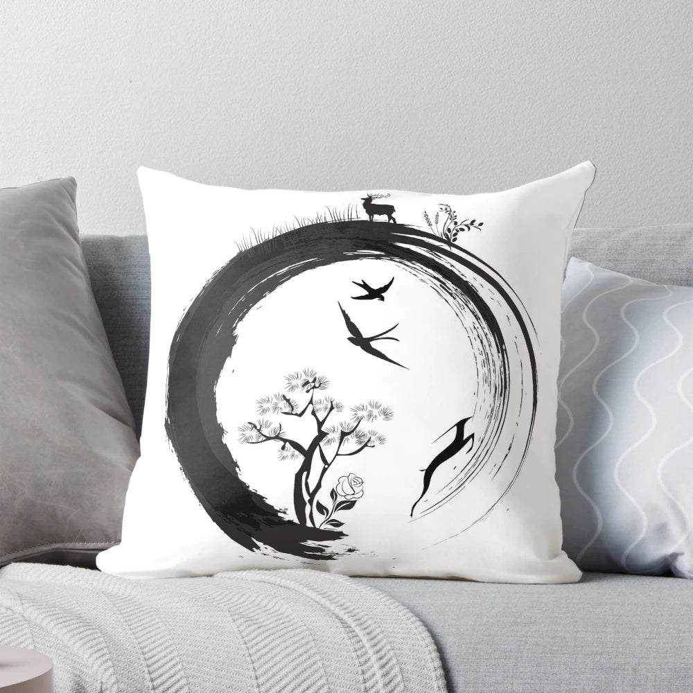 Pillow featuring a minimalist, zen-inspired enso circle design and a tree of life motif