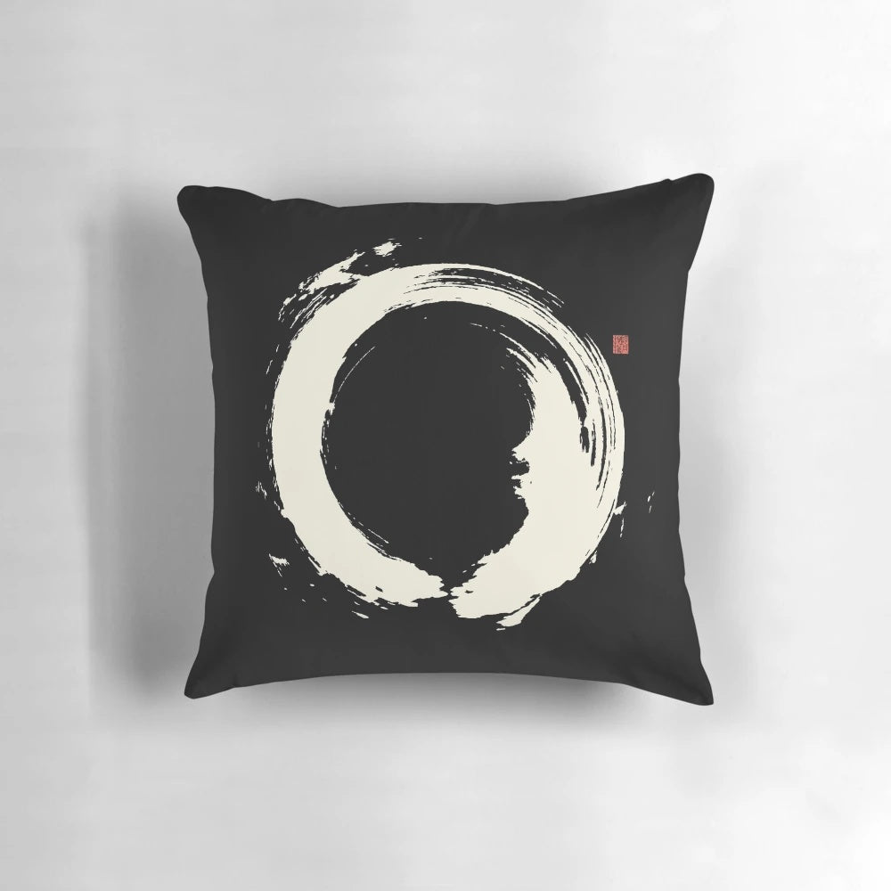 Black and white Japanese Zen circle (Ensō) pillow with brushstroke design for mindfulness and meditation