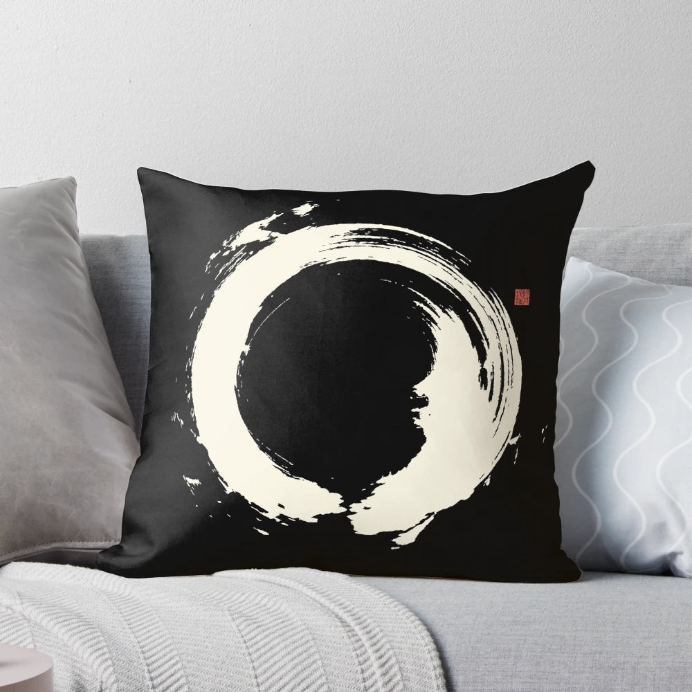 Black and white Japanese Zen circle (Ensō) pillow with brushstroke design for mindfulness and meditation