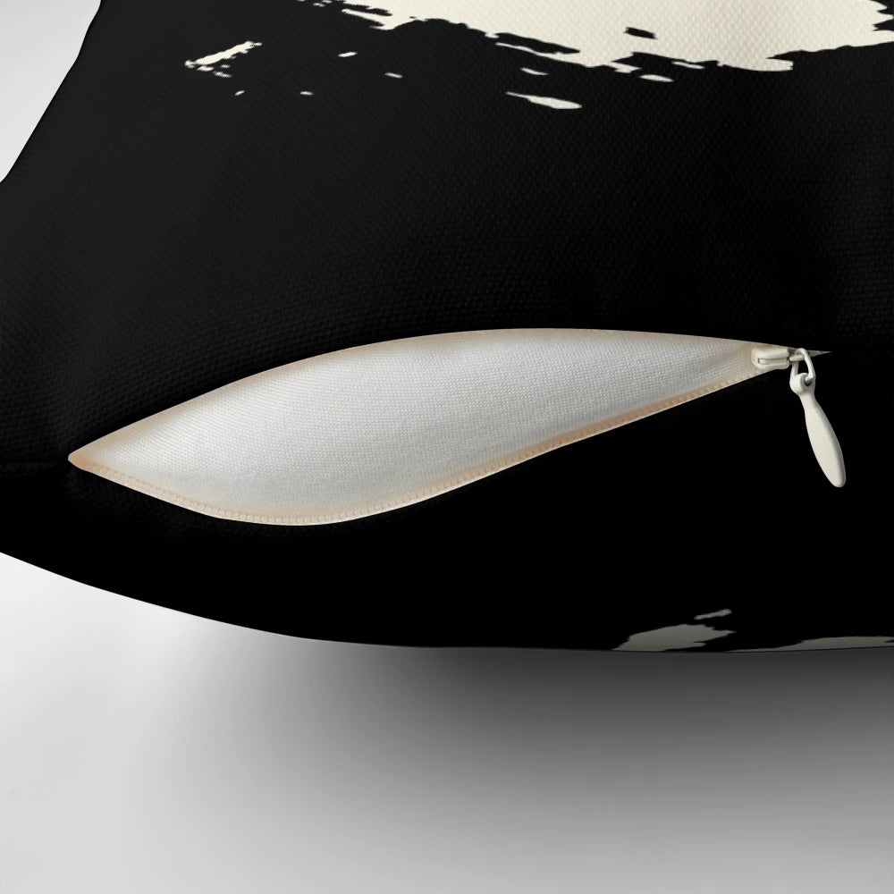Black and white Japanese Zen circle (Ensō) pillow with brushstroke design for mindfulness and meditation