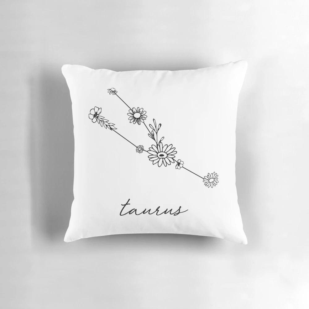Taurus zodiac sign wildflower constellation pillow with starry night background