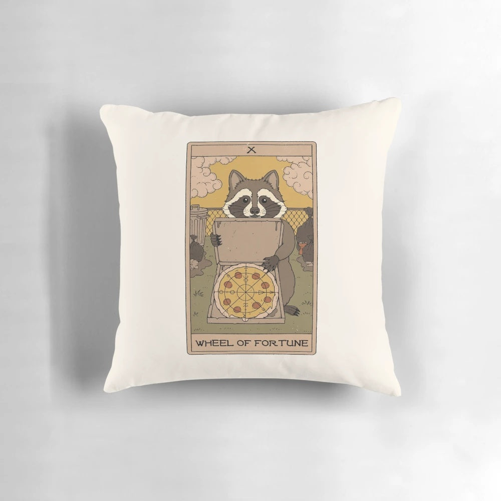 A decorative pillow featuring a whimsical raccoon tarot card design with astrological and fantasy elements.
