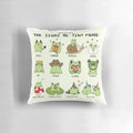Decorative pillow featuring tiny frog illustrations representing the different zodiac signs